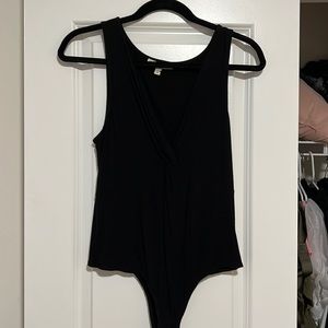 Black bodysuit with deep v-neck